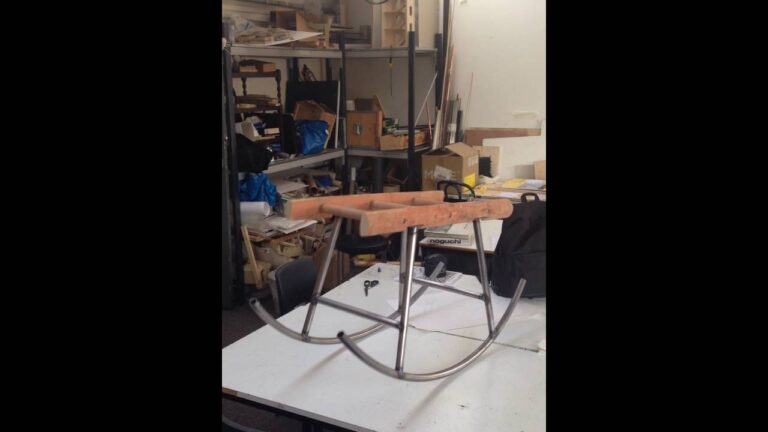 A brush confronts an elephant and they discuss show business