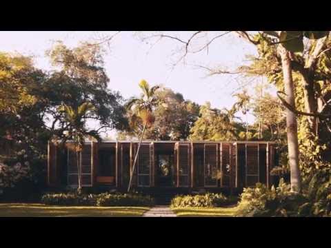 Wooden shutters swing open to reveal Miami house by Brillhart Architecture